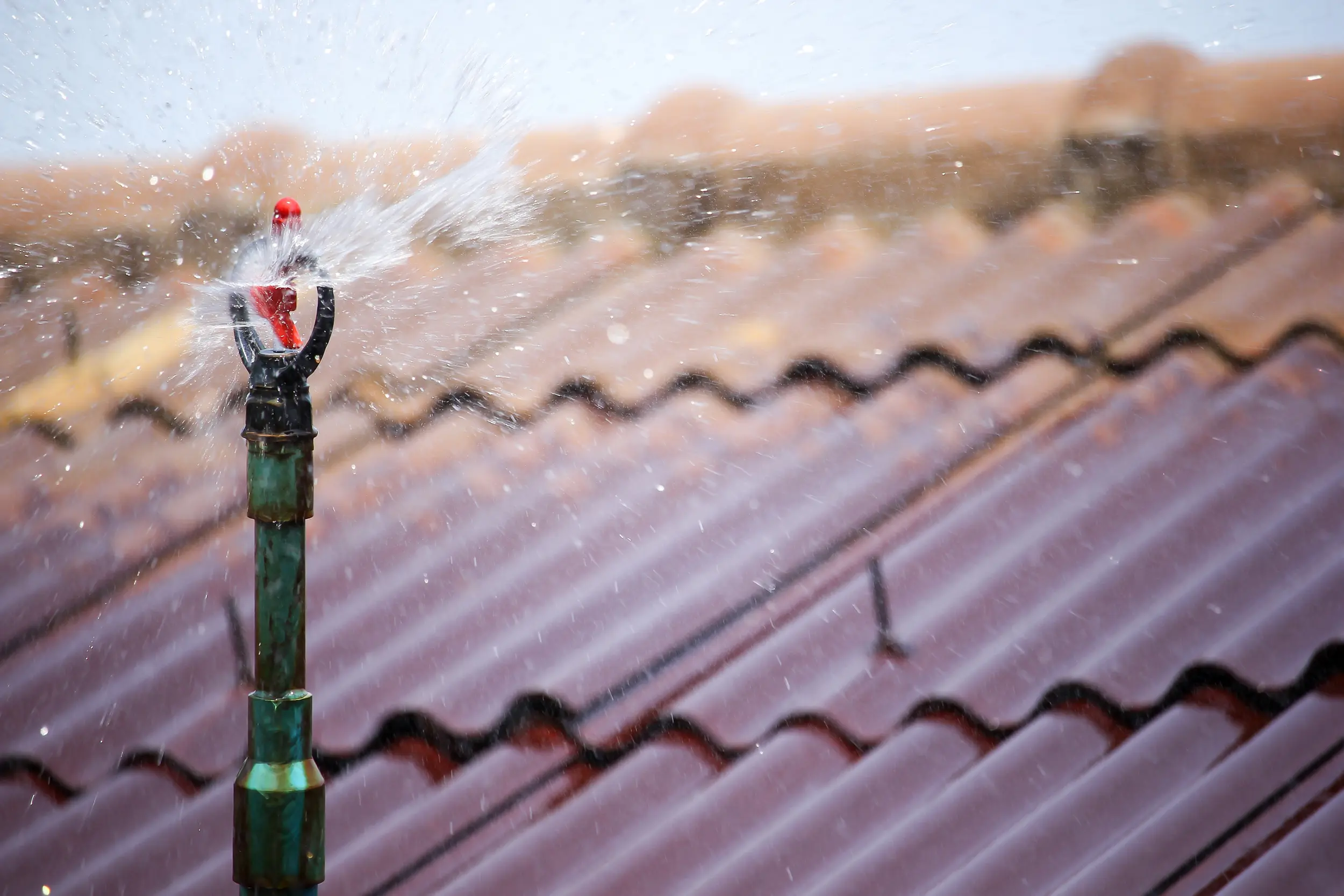 Water,Sprinkler,On,Roof