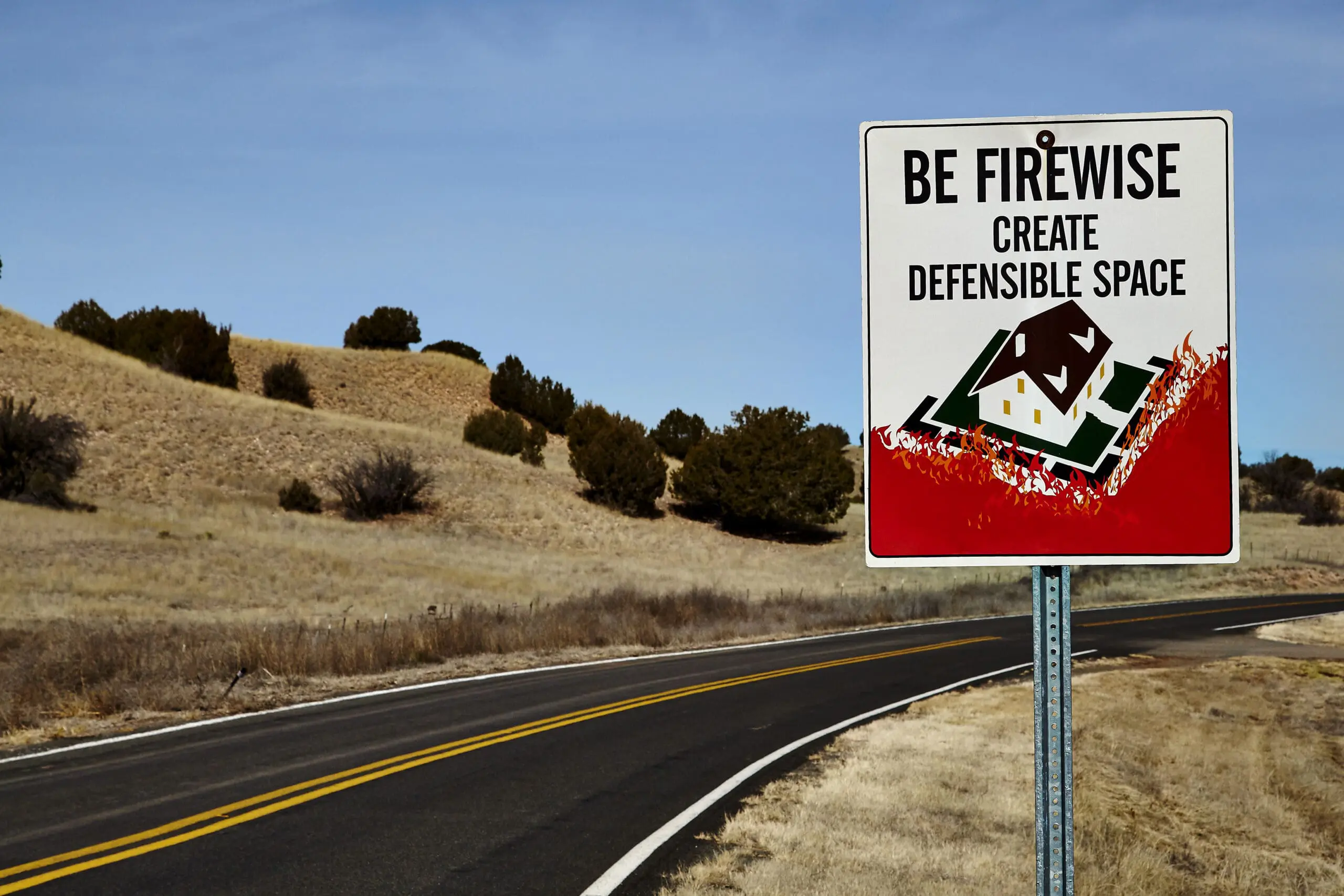 Be firewise road sign create defensible space